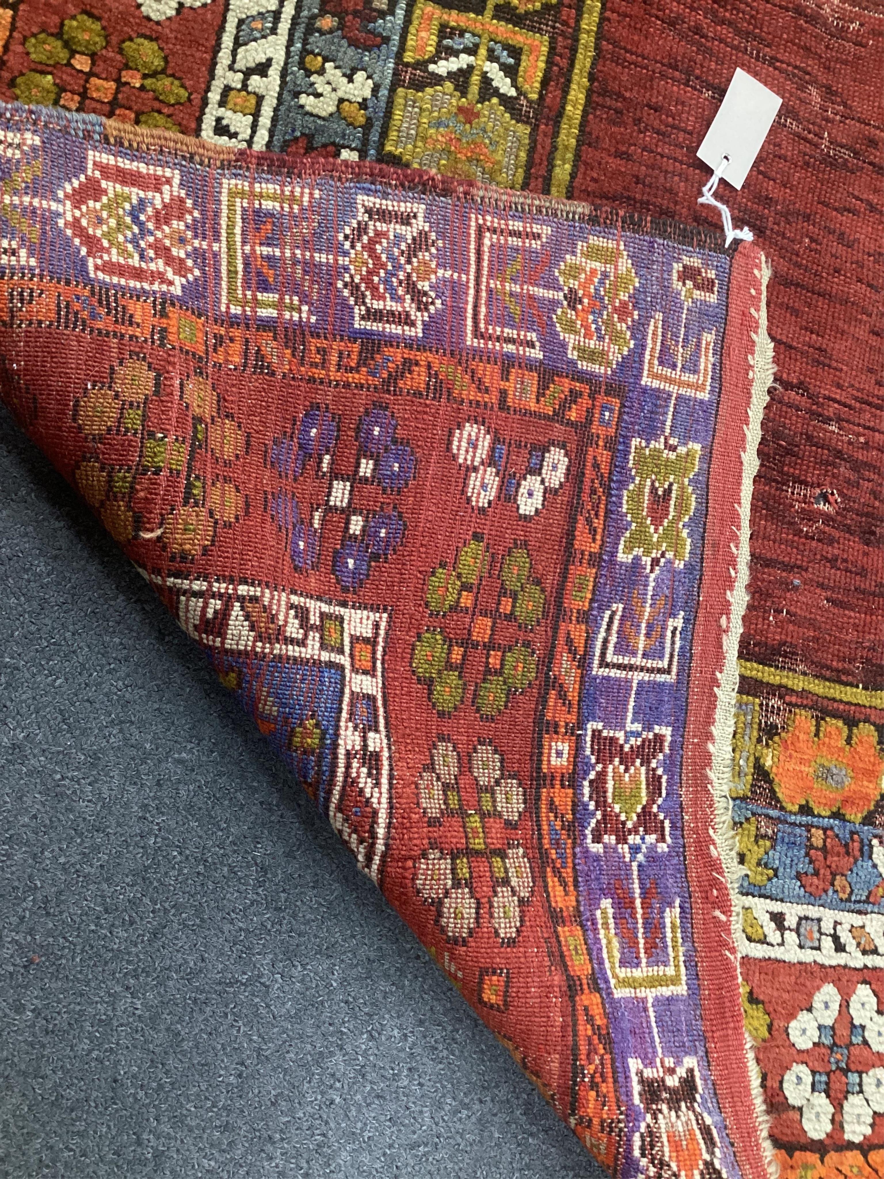 A Turkish prayer rug, 170 x 116cm. Condition - poor